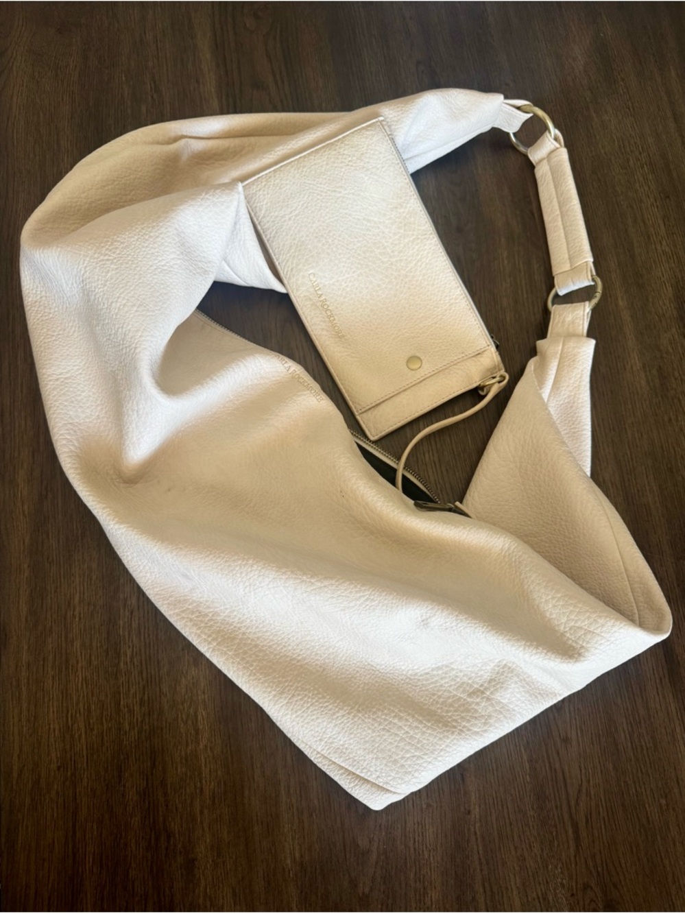 Carla Rockmore sling bag with pocket bag.
